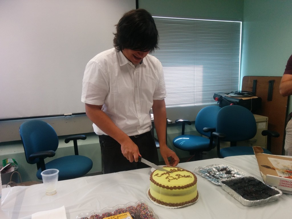 Brian cutting cake